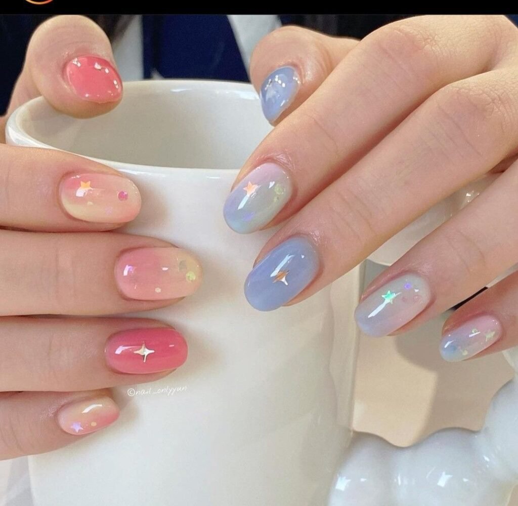 Dreamy Pink Short Nails Ideas blended with pastel gradients and star motifs.