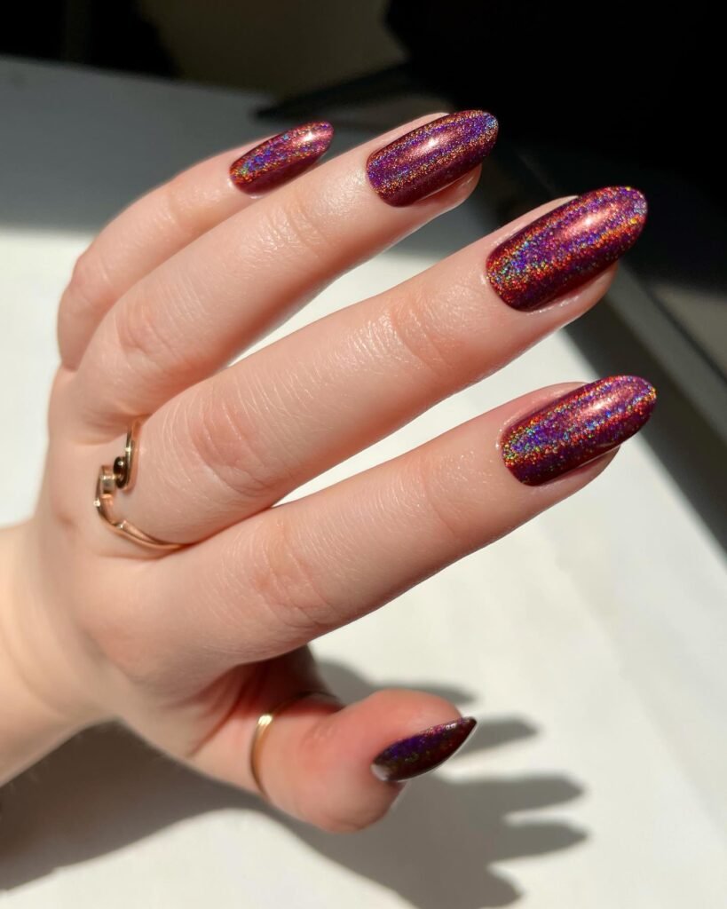 Dazzling holographic glitter concert nails ideas that catch the light perfectly for a pop or EDM event.