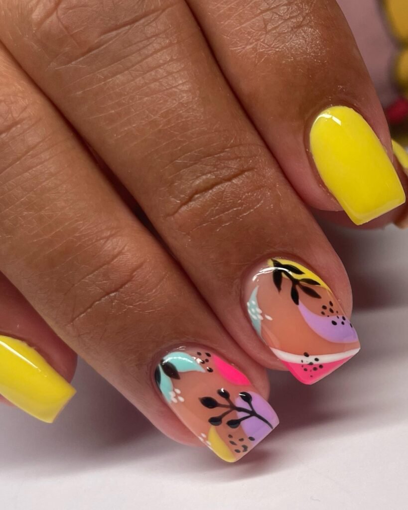 Colorful abstract floral and dot patterns as short square nails ideas for vibrant summer styles.