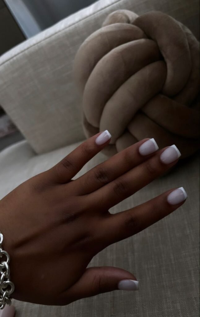 Elegant classic French tip design among white short nails ideas for a timeless look.