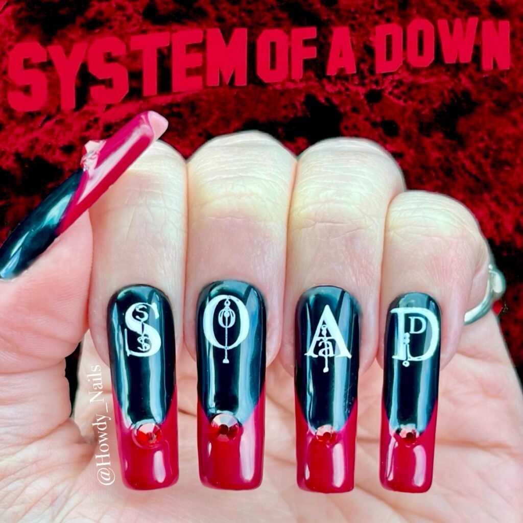 Fan tribute concert nails ideas spelling out SOAD with red accents for a System of a Down rock concert.