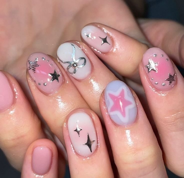 Cute Pink Short Nails Ideas featuring starry designs and silver bows on gradient pink bases.