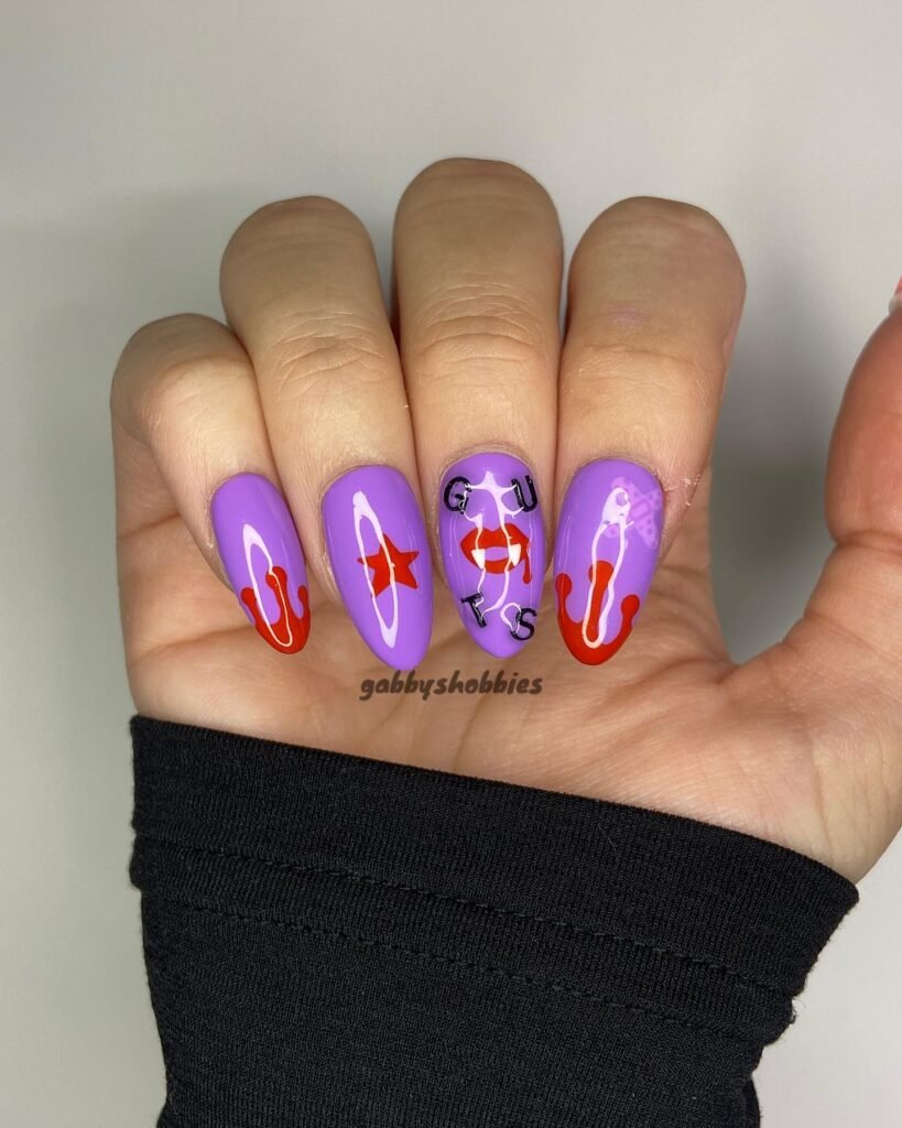 Edgy olivia rodrigo nails ideas featuring vampire mouth, GUTS text and ghost on purple nails