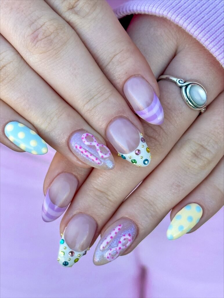 Adorable pastel 18th birthday nails featuring glitter "18", colorful rhinestones and polka dots