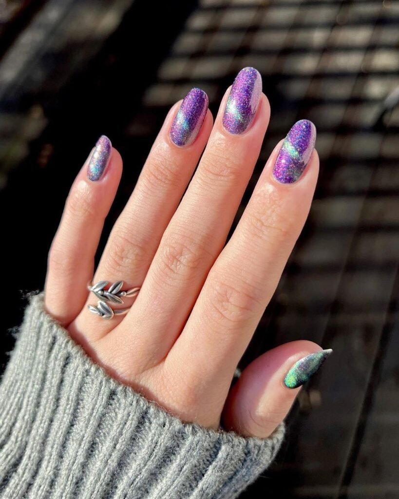 Sparkly holographic purple to green shifting glitter nails for Mardi Gras nails ideas