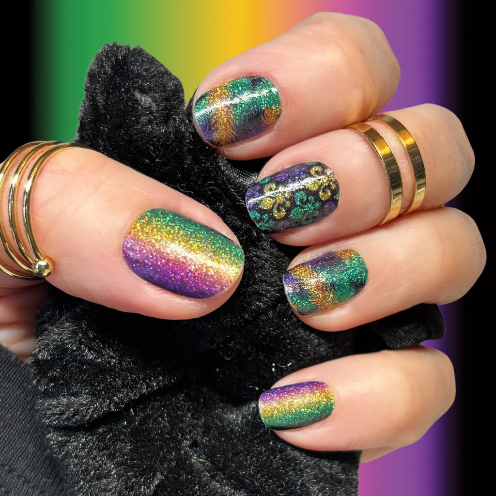 Bright rainbow holographic glitter nails in fun Mardi Gras nails ideas style