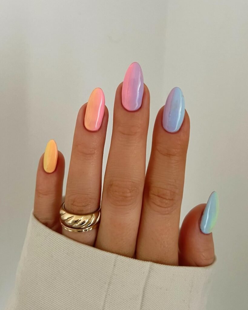 Stunning multi-colored chrome oval nails in soft pastel shades for these dreamy painted nails ideas