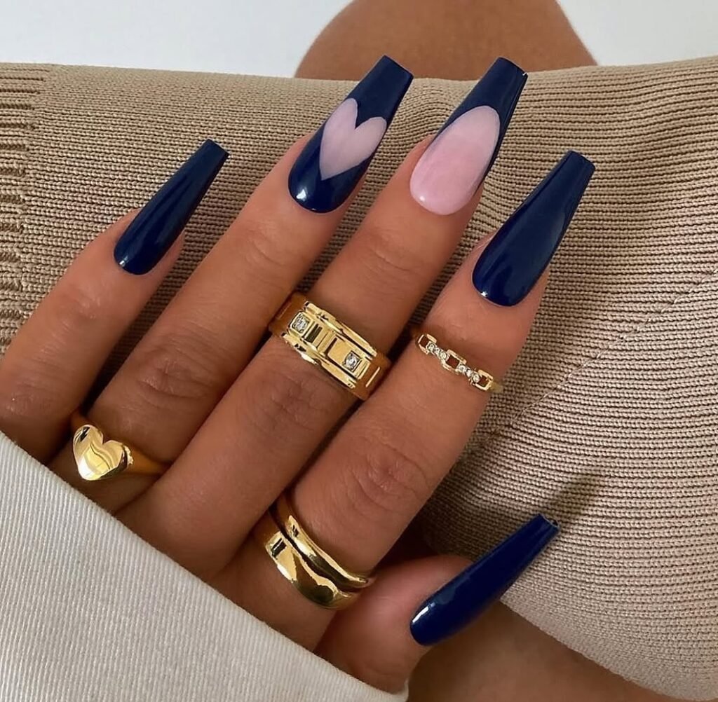 Sleek navy blue nails with soft pink heart accent ballerina nails designs ideas
