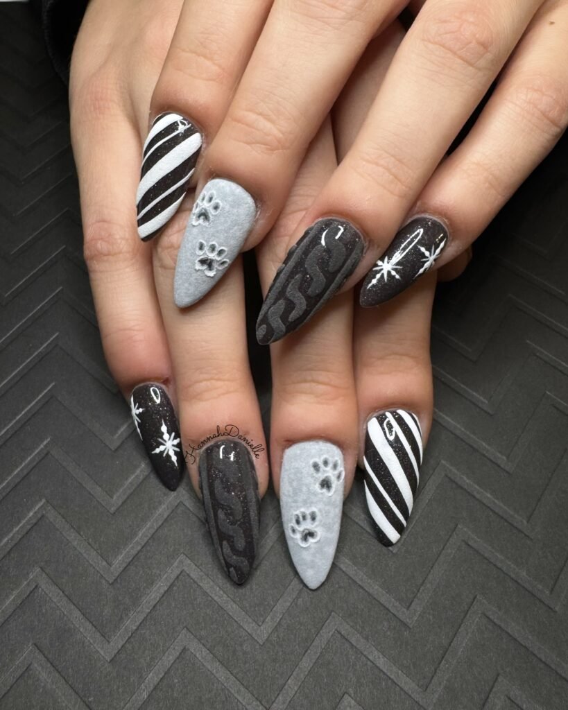 Stylish black white and grey gender reveal nails ideas with paw prints and stripes