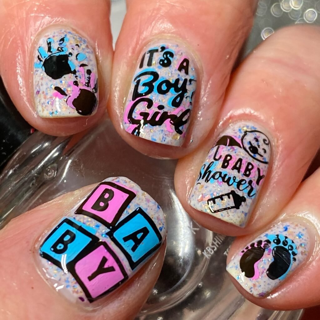 Bold "It's a Boy Girl" baby shower gender reveal nails ideas with colorful glitter and text