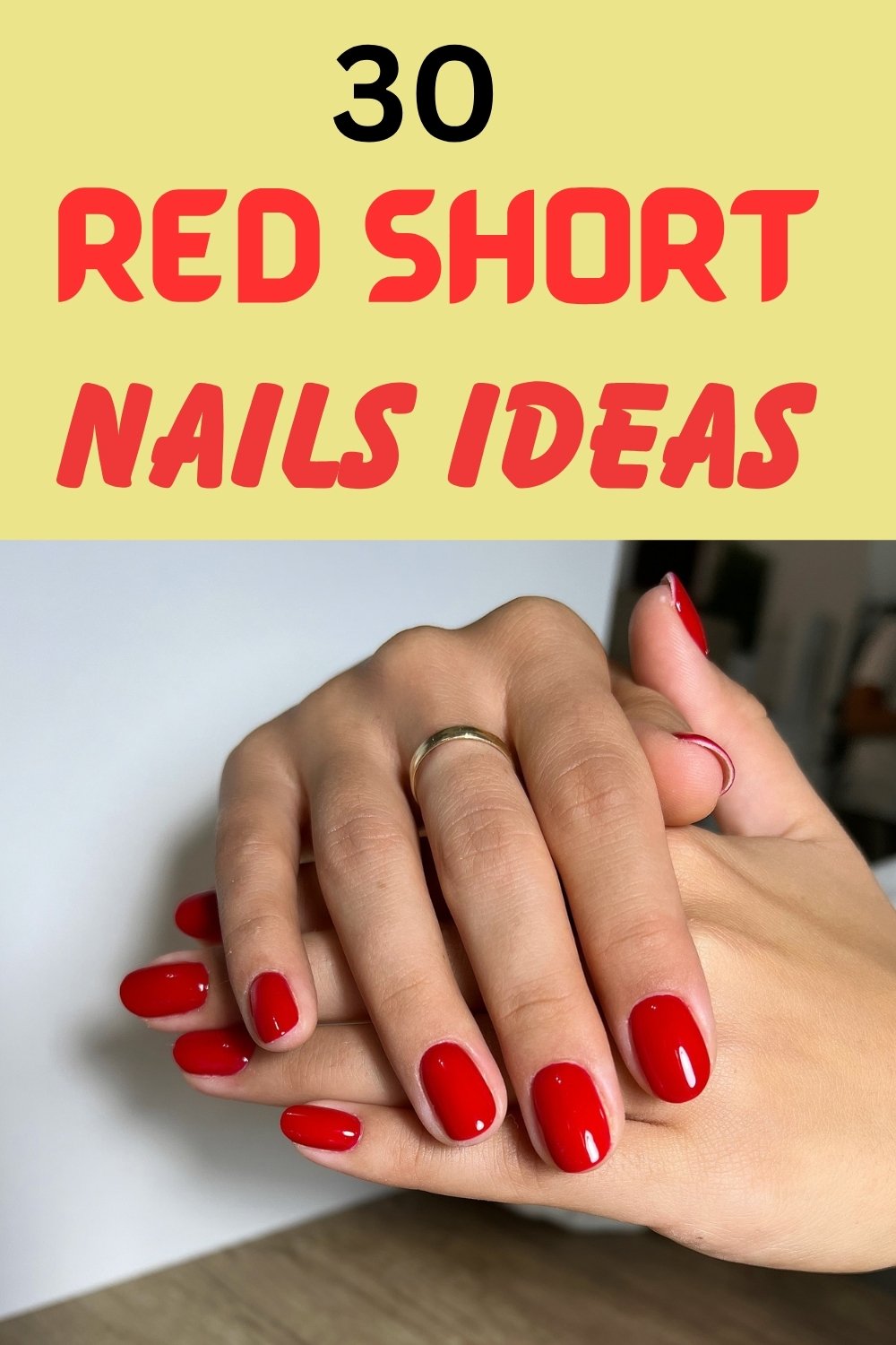Graphic with yellow and red text reading "30 RED SHORT NAILS IDEAS" above a photo of clasped hands showcasing glossy, bright red short nails, worn with a simple gold ring.
